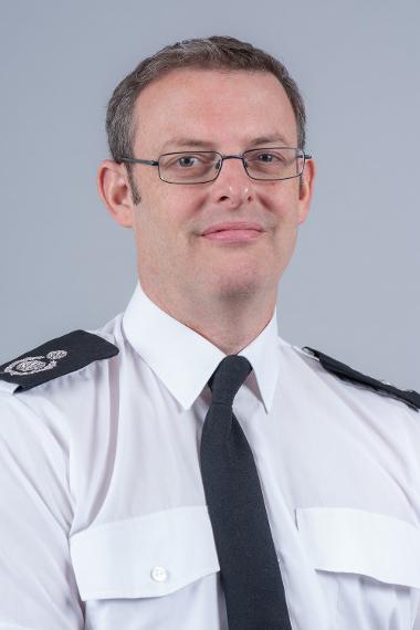 Photograph of Tony White in uniform with tie portrait