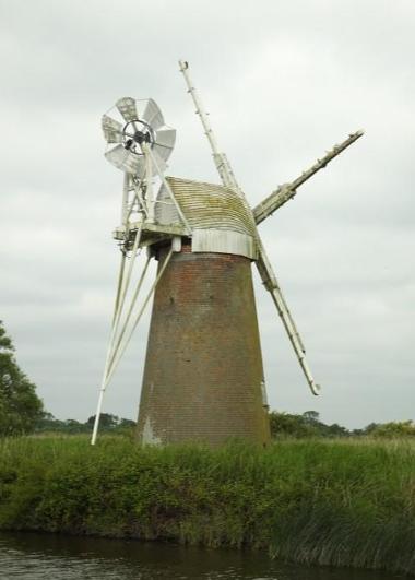 Photograph of Turf Fen Drainage Mill showing the white boat-shaped cap
