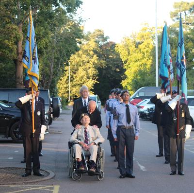 WW2 vets leading parade with cadets and standard bearers